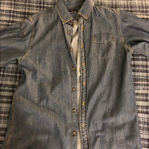 This a denim bottom down shirt from class club